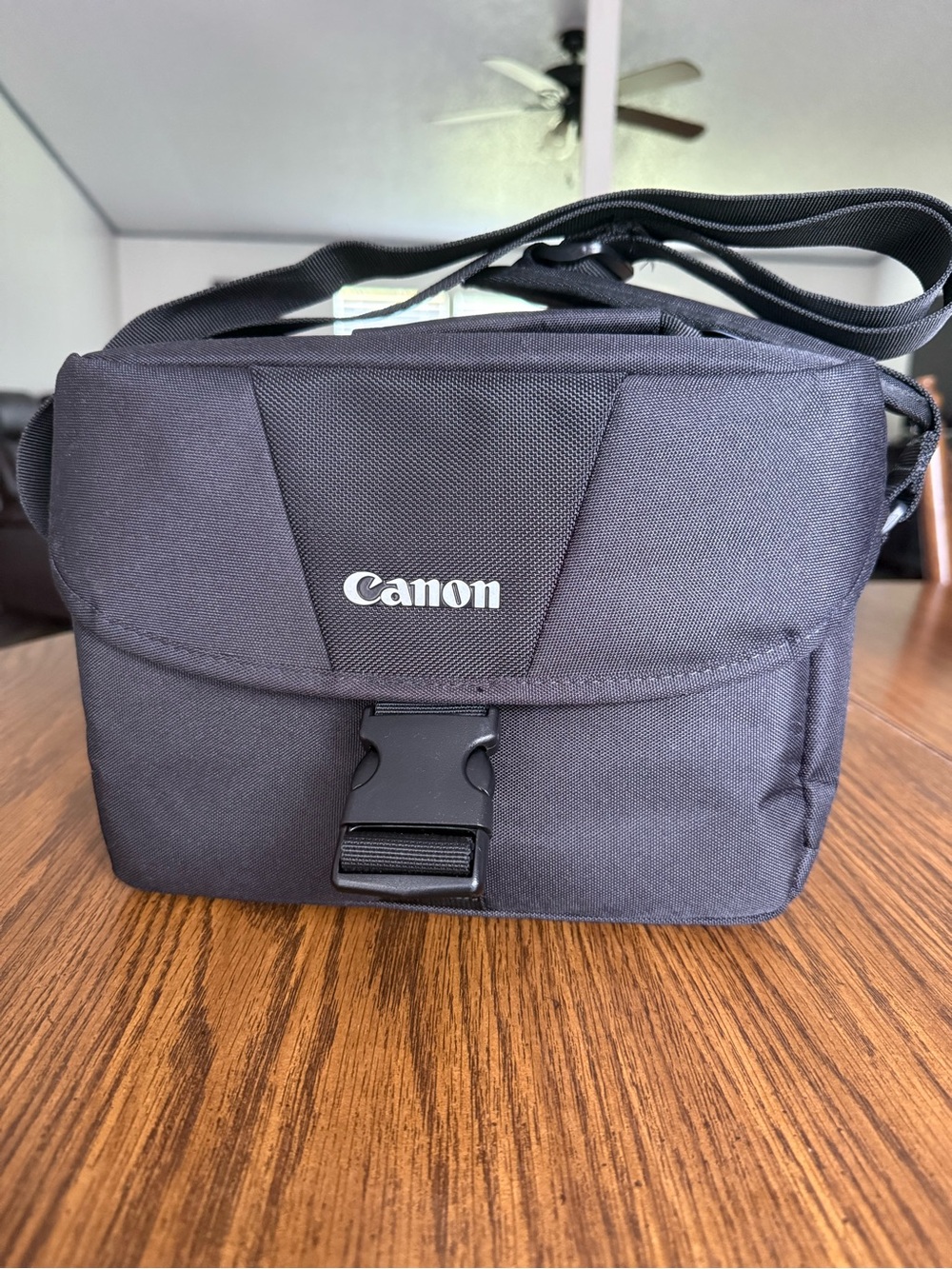 Canon Black Compact Camera Messenger Bag with Buckle Closure